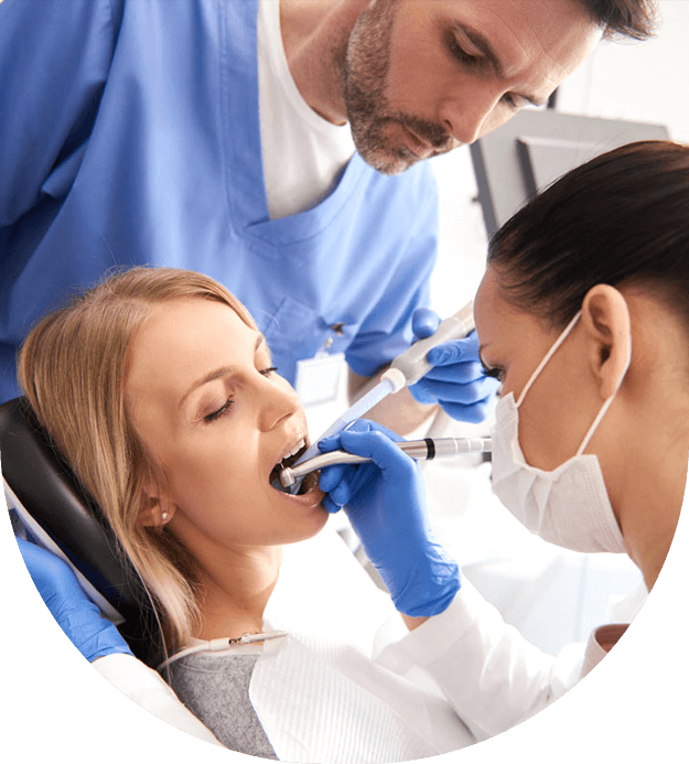 Young female patient receiving dental care stock image